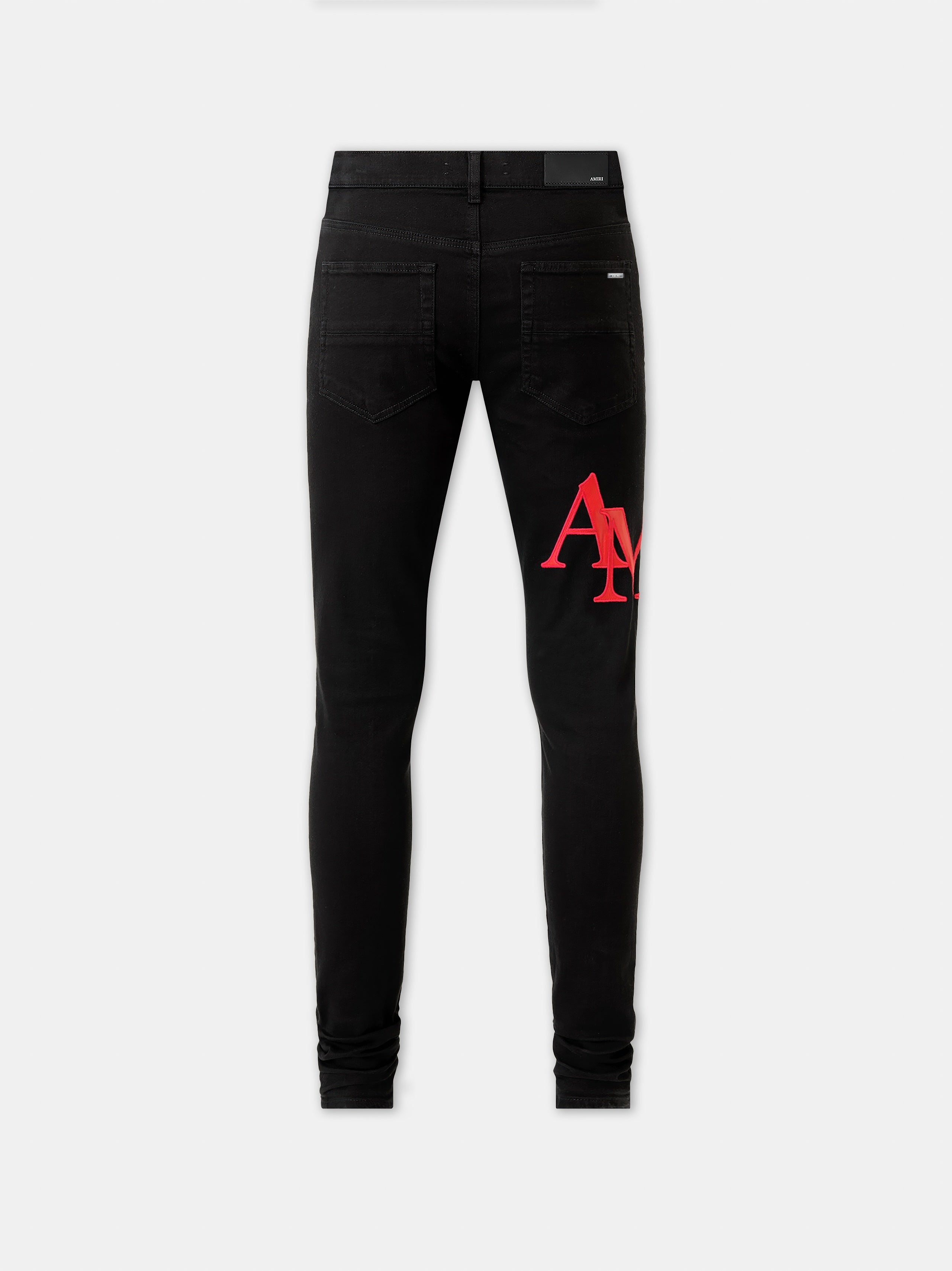 STAGGERED LOGO SKINNY JEAN- Black Red