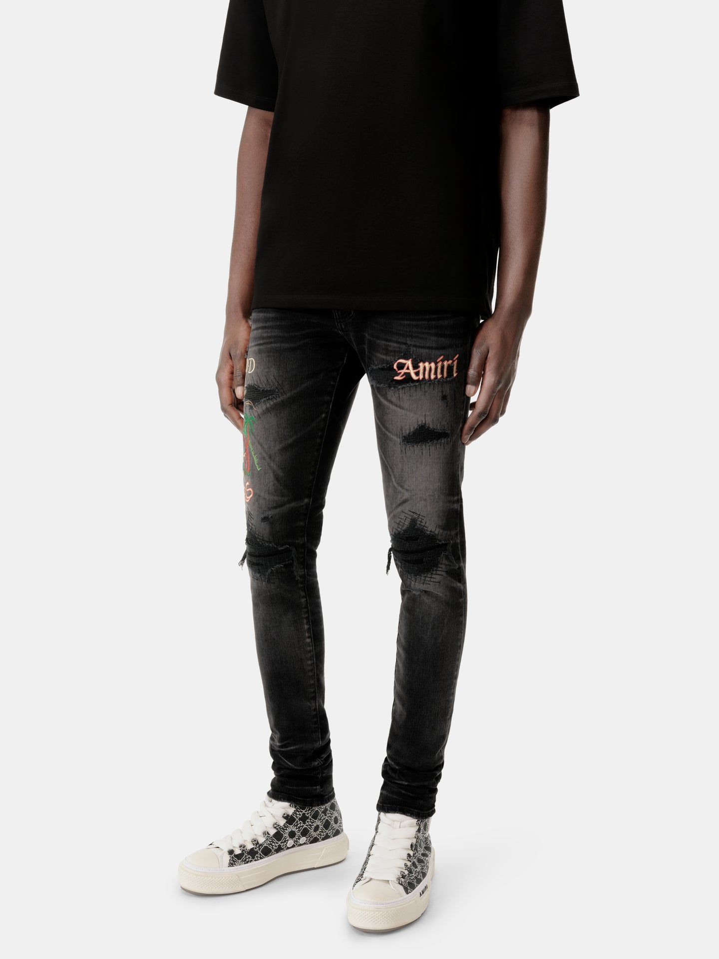 EMBROIDERED SINNERS SKINNY JEAN - Faded Black - AMIRI