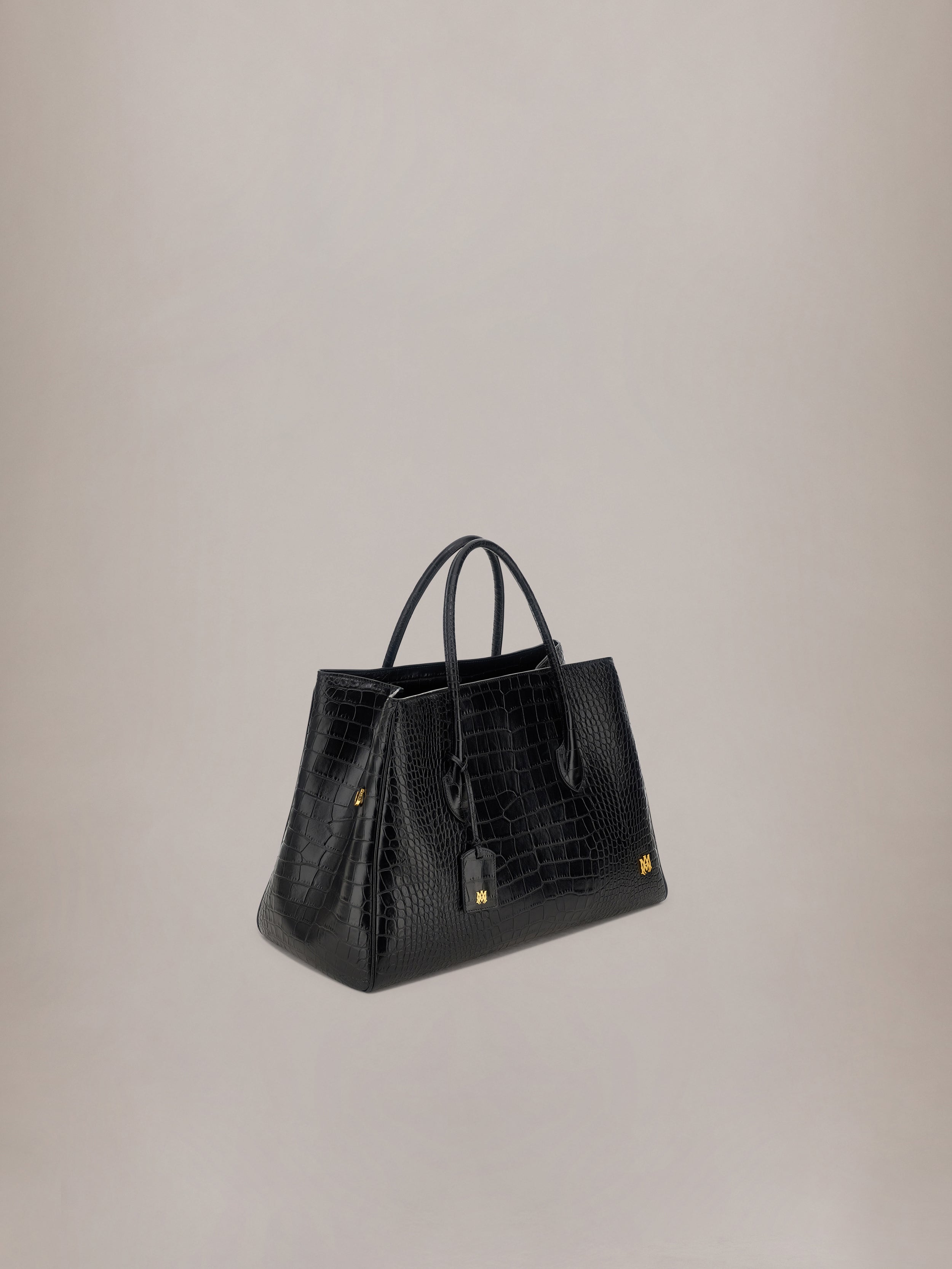 EMBOSSED CROC HONEY 50 TOTE - Black – AMIRI