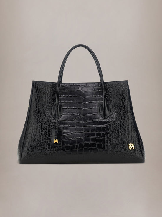 Black embossed crocodile tote bag with dual handles and gold hardware accents on the sides.