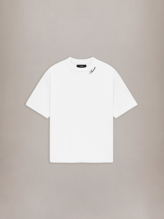 White crew neck t-shirt with black script logo on upper chest.
