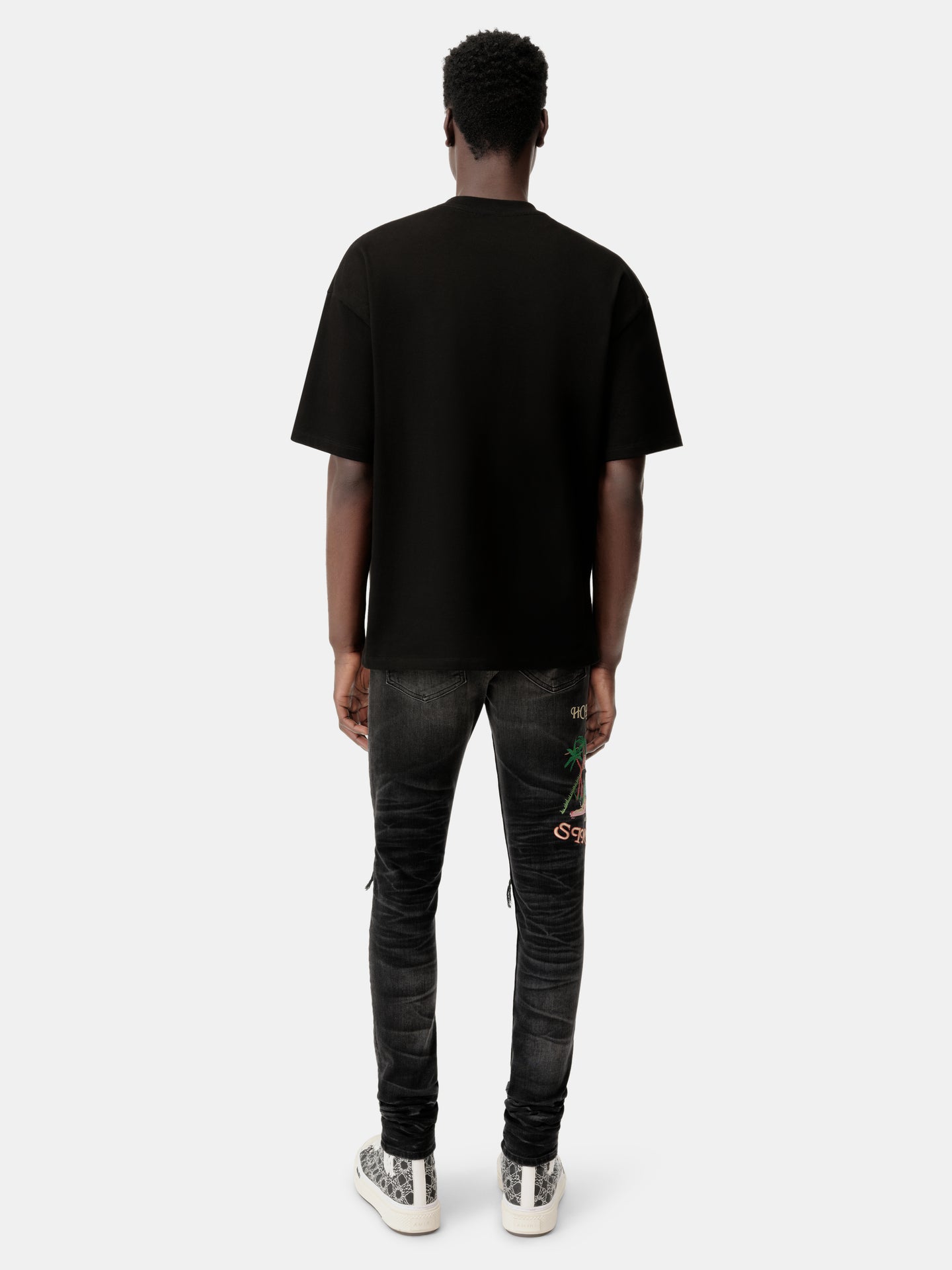 EMBROIDERED SINNERS SKINNY JEAN - Faded Black - AMIRI