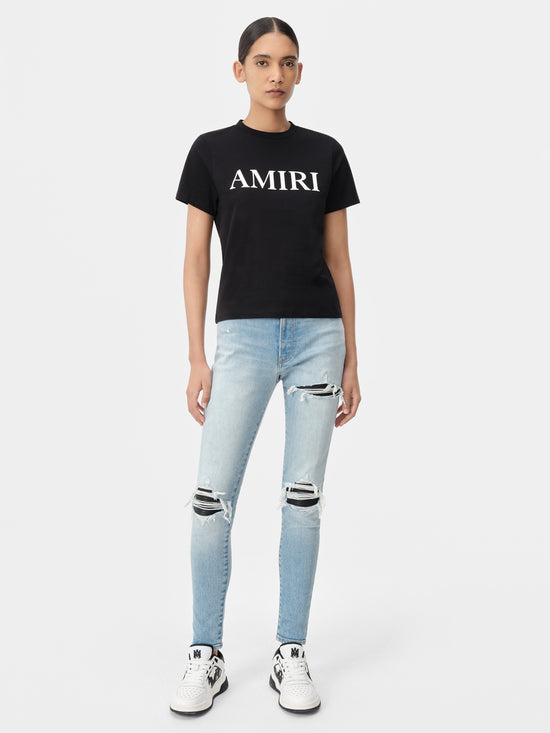 AMIRI Women's MX1 Jean in Antique Indigo with Amiri Core Logo Tee in Black and White Black Classic Low Sneakers