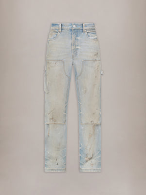 Light-wash carpenter jeans with large front and thigh pockets, distressed details, and faded indigo denim.