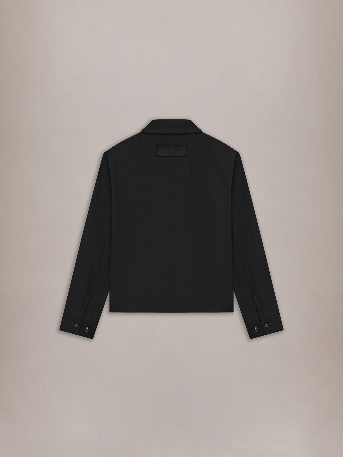 Black blouson jacket with collared neckline and button cuffs, displayed on neutral background.