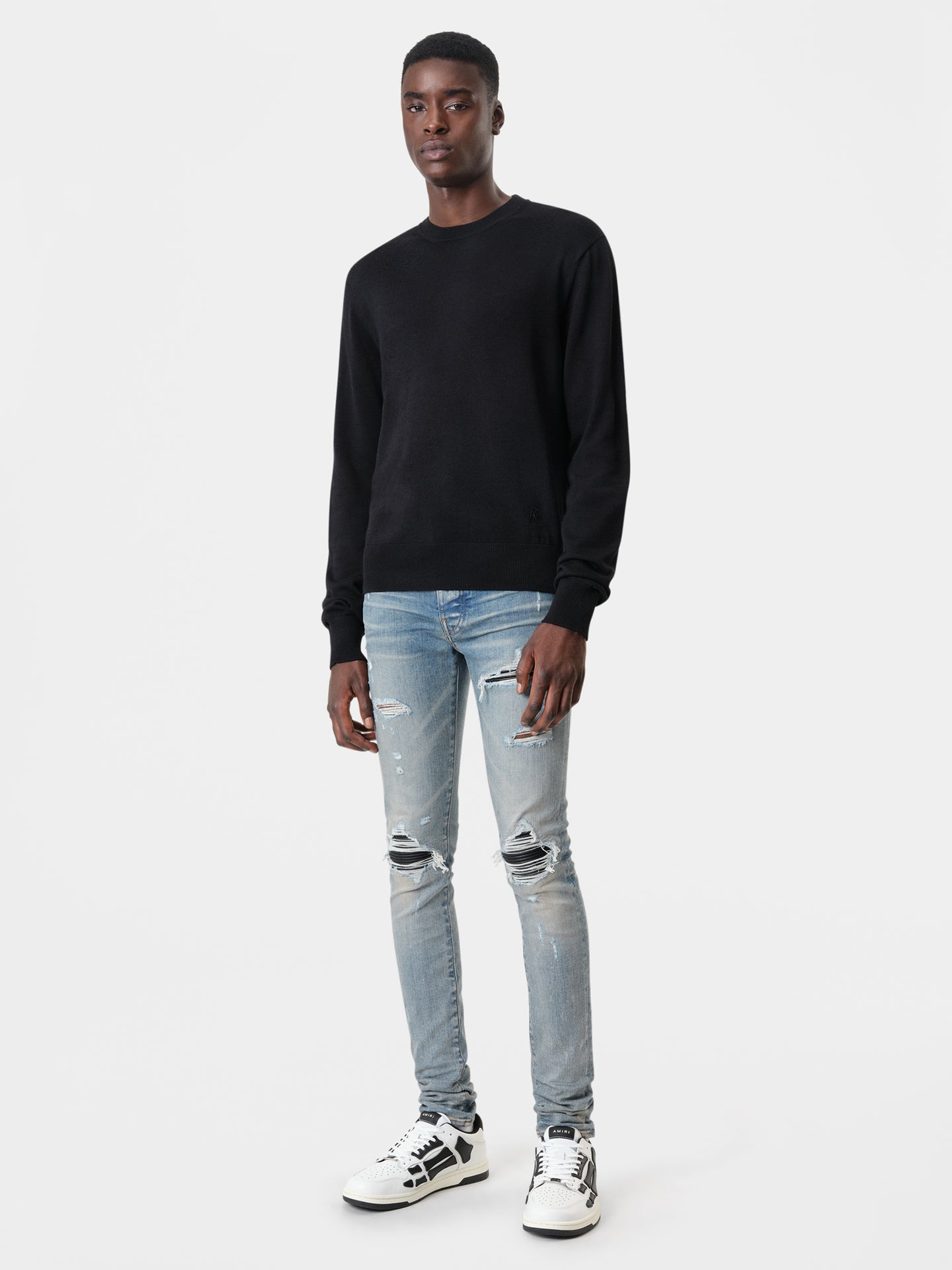 AMIRI MX1 Jean in Clay Indigo with MA Long Sleeve Black Shirt and White Black Skel Top Low Sneakers