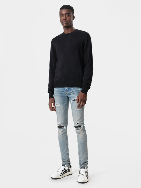 AMIRI MX1 Jean in Clay Indigo with MA Long Sleeve Black Shirt and White Black Skel Top Low Sneakers