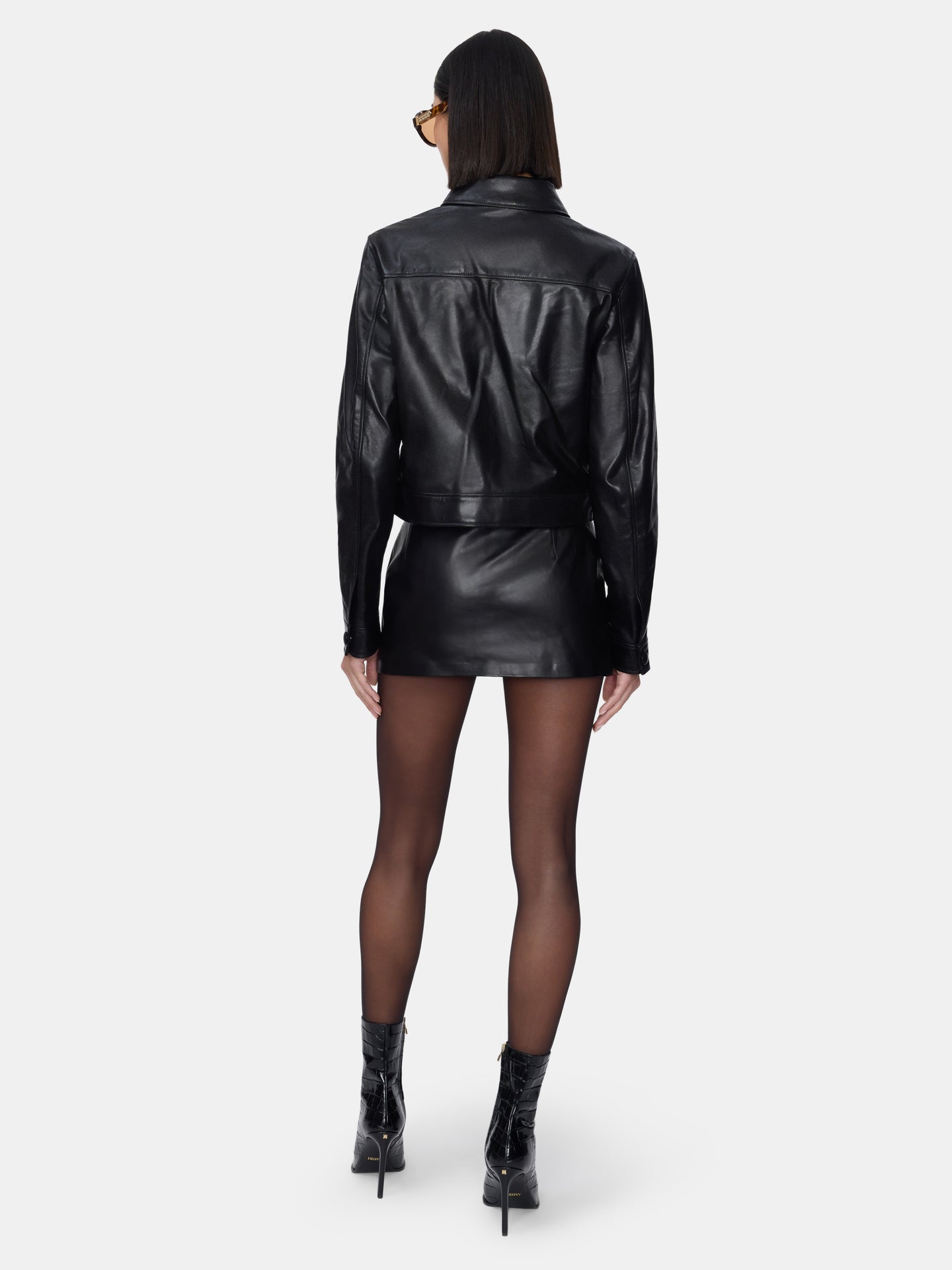 WOMEN - WOMEN'S LEATHER MINI SKIRT - BLACK - AMIRI