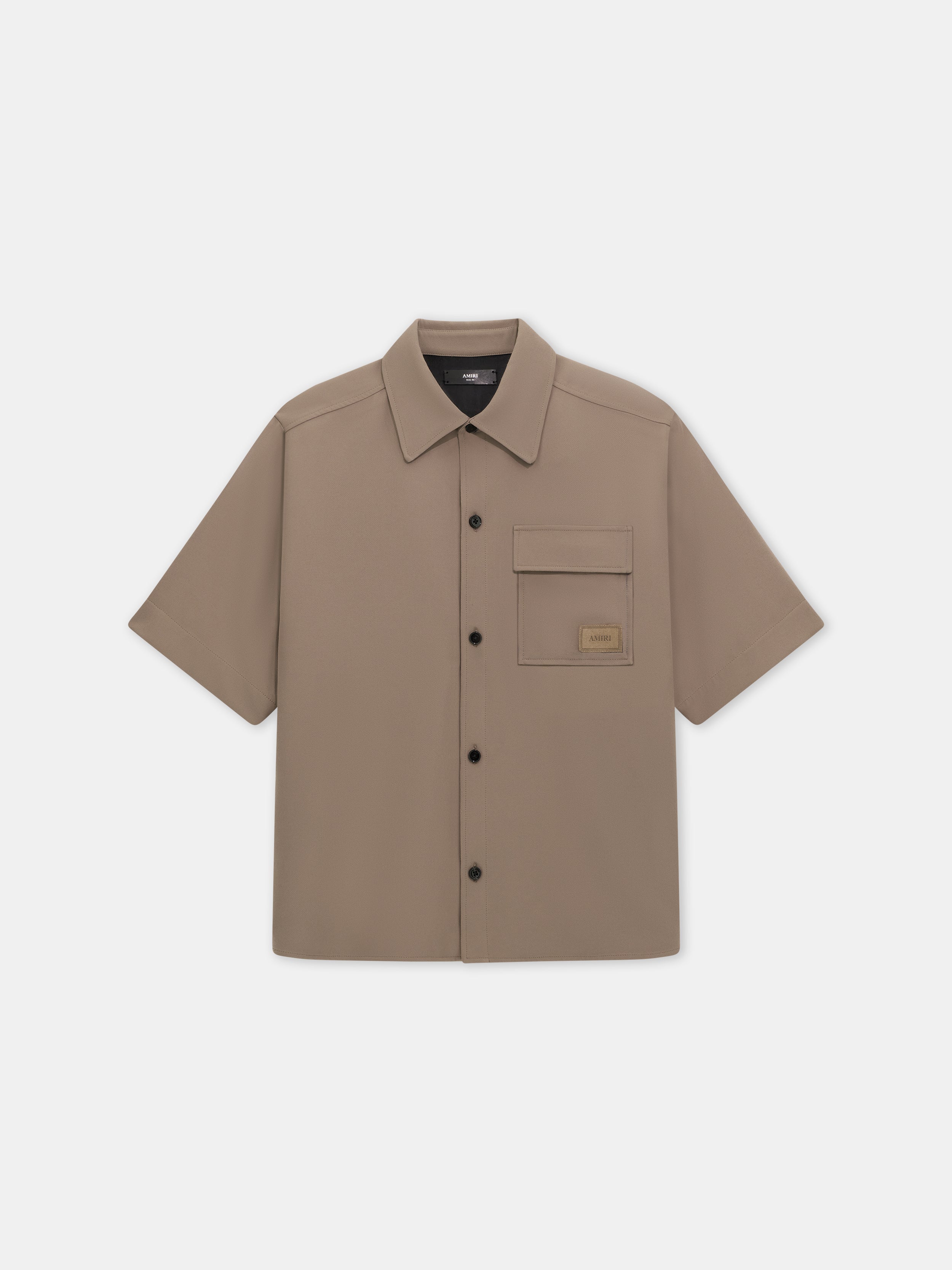 Product AMIRI PATCH CADY SHORT SLEEVE POCKET SHIRT - Dark Sand featured image