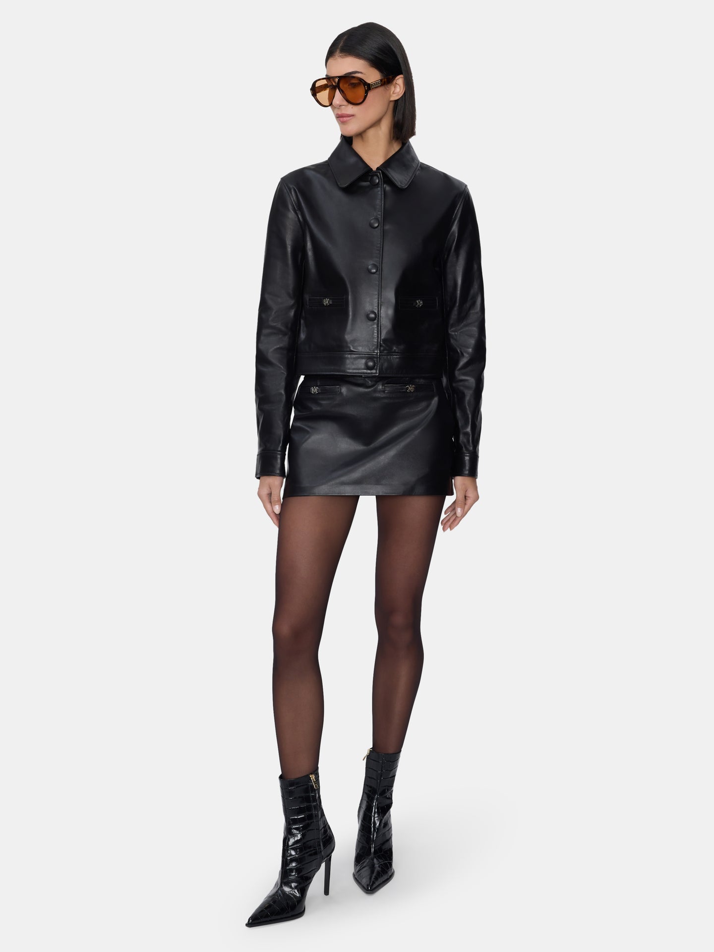 WOMEN - WOMEN'S LEATHER MINI SKIRT - BLACK - AMIRI