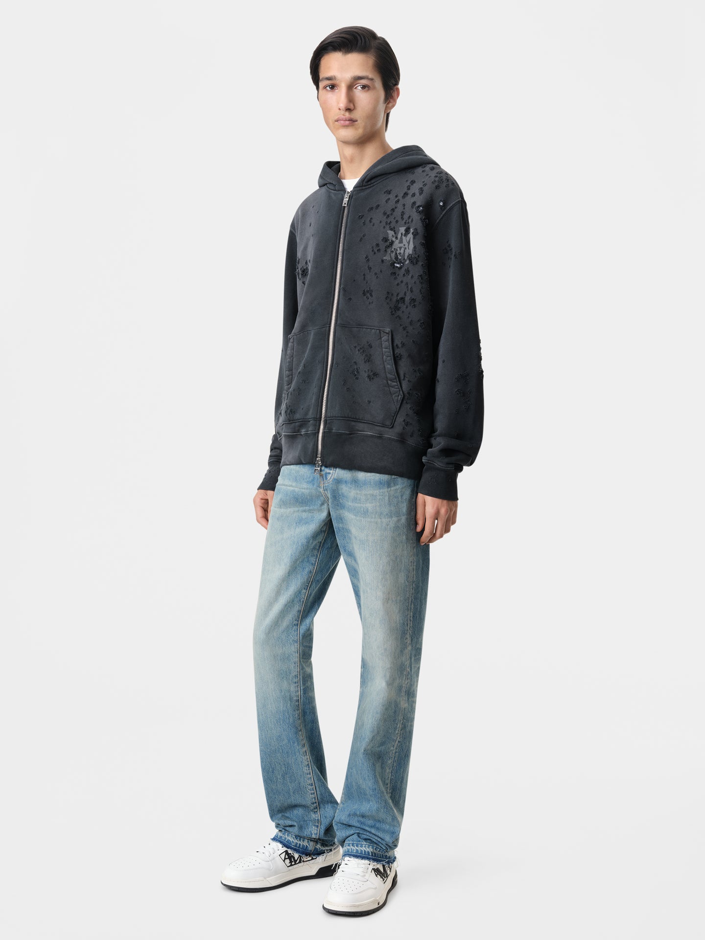 AMIRI MA Shotgun Zip Up Hoodie in Faded Black with Released Hem Straight Jean in Antique Indigo and White Black Classic Low Sneakers