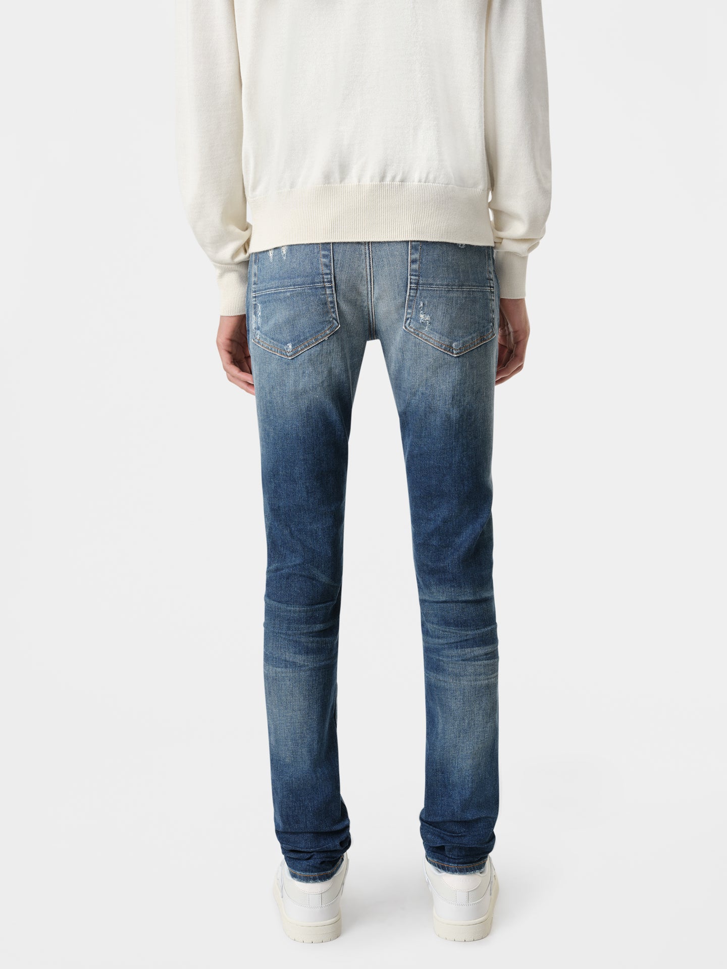 AMIRI Stack Jean in Deep Classic with MA Long Sleeve in White and Vintage White Skel Top Low Sneakers