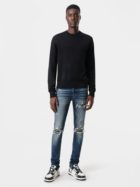 AMIRI MX1 Jean in Deep Classic Indigo with MA Long Sleeve Black Shirt and Black White Skel Top Low Sneakers