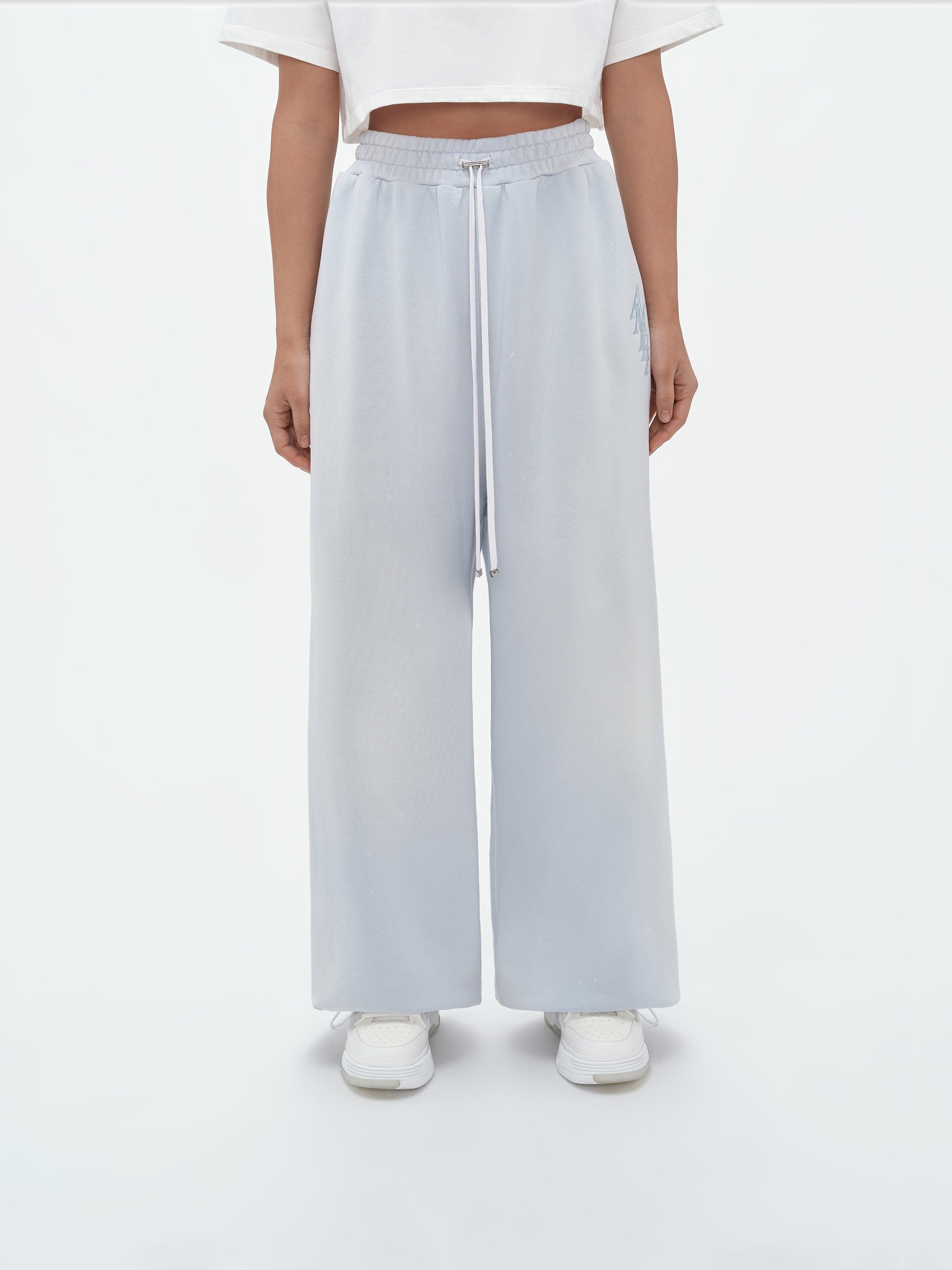 Product WOMEN - STACKED AMIRI BAGGY SWEATPANT - Gray Dawn featured image